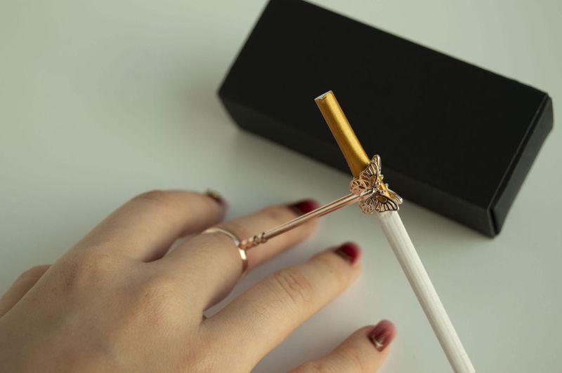 The Cigarette-Pack Holder Ring