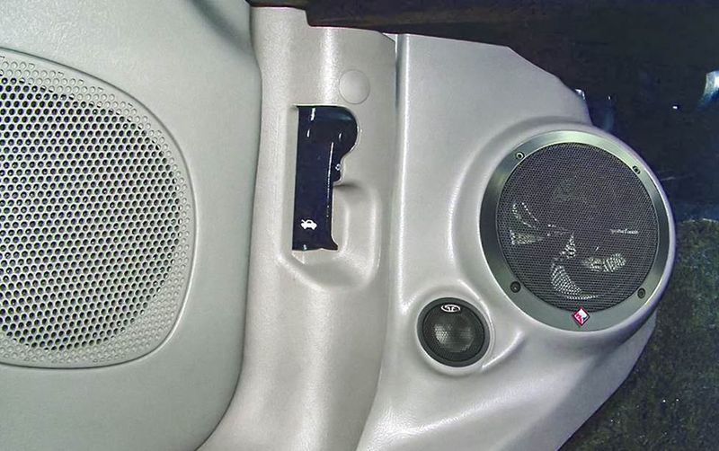 Metal Speaker Boxes Hanging on Car Windows