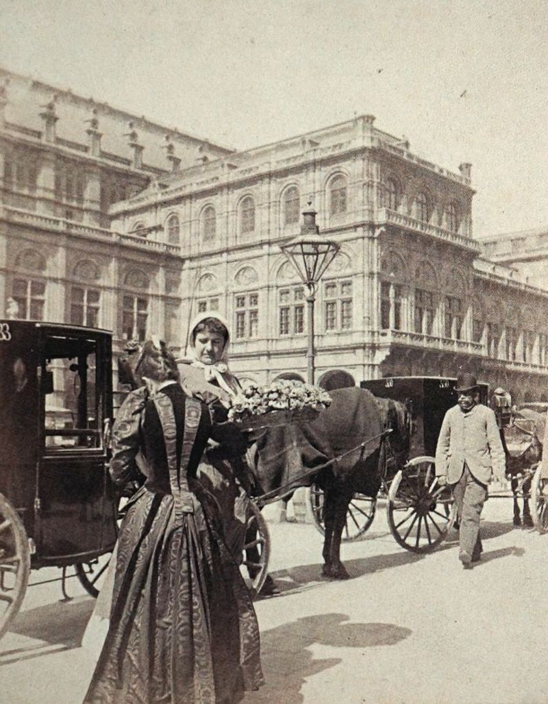 A flower seller in front of the Vienna opera house in 1890