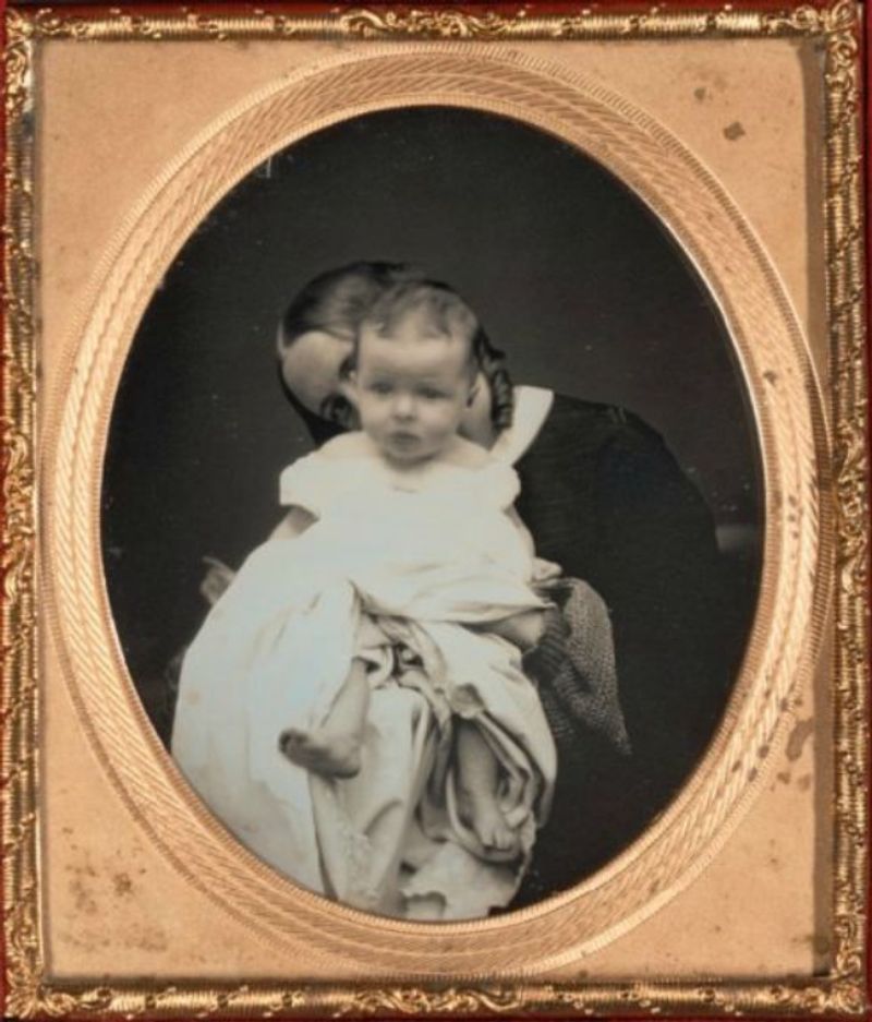 The Oval-Framed Baby Portraits